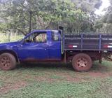 Carro Nissan Y Moto Um200