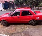 Nissan B12