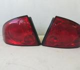 Juego Stop B15 Nissan